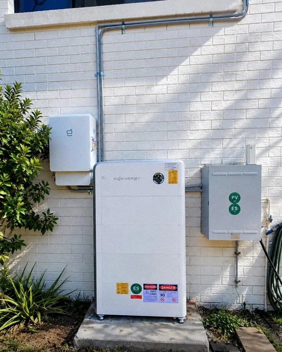 Battery and isolators on a white wall